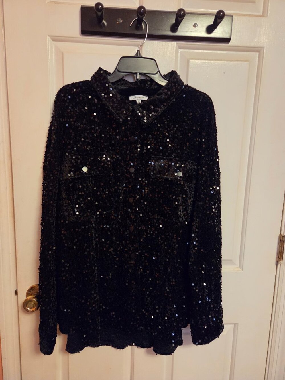 White Birch Black light weight sequin jacket.